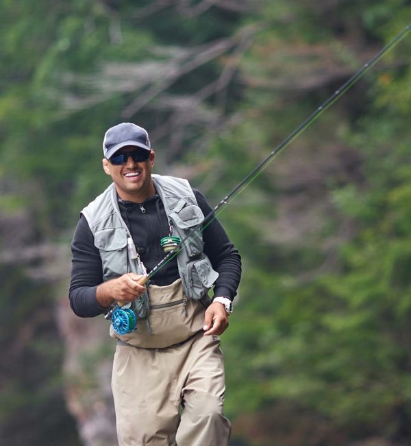 cheerful-man-fishing-in-rough-mountain-river-5SZKGVB-resize.jpg