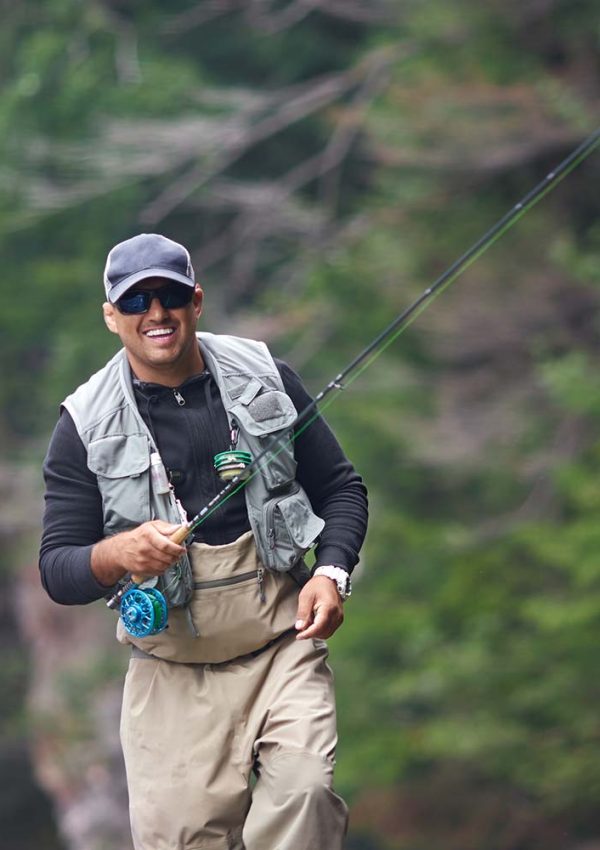 cheerful-man-fishing-in-rough-mountain-river-5SZKGVB-resize.jpg